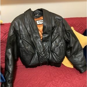 Vintage Black Leather & Suede bomber style men’s jacket with Down filled lining.